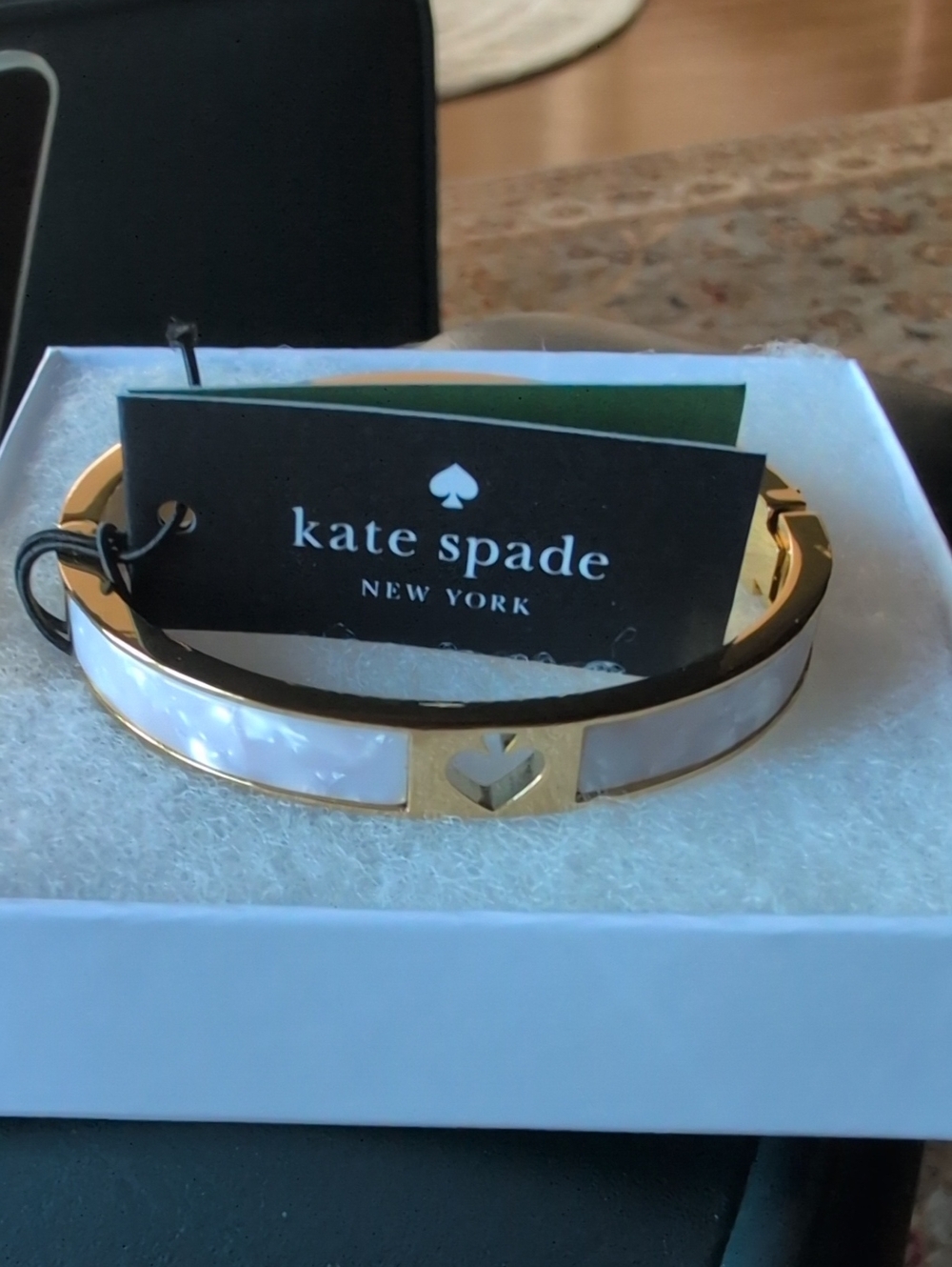 kate spade New York Gold-tone Bangle with Cream Inlay And Hole Punch Spade. NWT